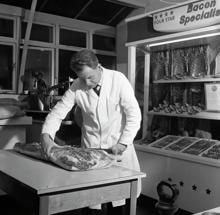 Framed Print : Butcher from Danish Bacon giving a demonstration, Kilnhurst, South Yorkshire, 1961 Framed Print : Butcher from Danish Bacon giving a demonstration, Kilnhurst, South Yorkshire, 1961