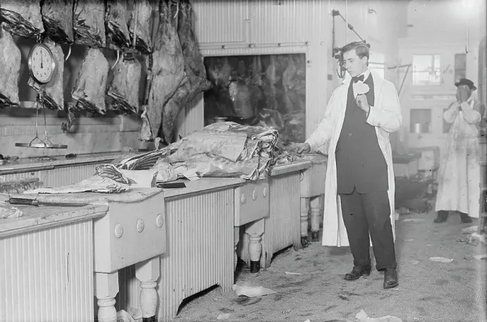 Framed Print : Butcher stands idle before his counter of meat during the meat boycott, 1910. Creator: Bain News Service Framed Print : Butcher stands idle before his counter of meat during the meat boycott, 1910. Creator: Bain News Service