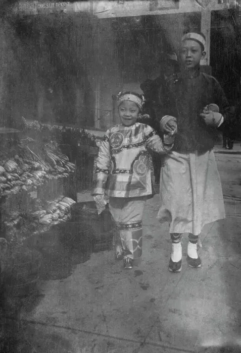 Framed Print : Buying New Year's gifts, Chinatown, San Francisco, between 1896 and 1906. Creator: Arnold Genthe Framed Print : Buying New Year's gifts, Chinatown, San Francisco, between 1896 and 1906. Creator: Arnold Genthe