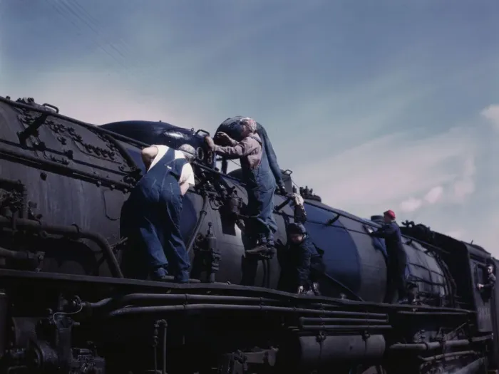 Framed Print : C. & N.W. R.R. women wipers employed at the roundhouse cleaning one of the... Clinton, Iowa, 1943. Creator: Jack Delano Framed Print : C. & N.W. R.R. women wipers employed at the roundhouse cleaning one of the... Clinton, Iowa, 1943. Creator: Jack Delano