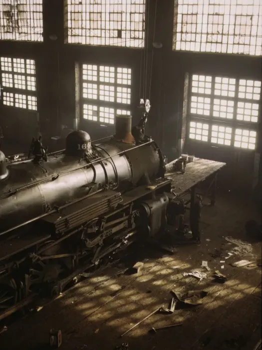 Framed Print : C & NW RR working on a locomotive at the 40th Street railroad shops, Chicago, Ill. 1942. Creator: Jack Delano Framed Print : C & NW RR working on a locomotive at the 40th Street railroad shops, Chicago, Ill. 1942. Creator: Jack Delano