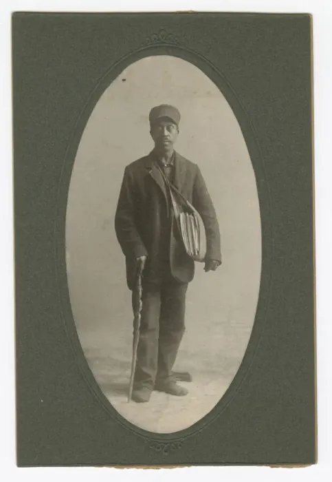 Framed Print : Cabinet card of a newspaper carrier, mid to late 19th century. Creator: Unknown Framed Print : Cabinet card of a newspaper carrier, mid to late 19th century. Creator: Unknown