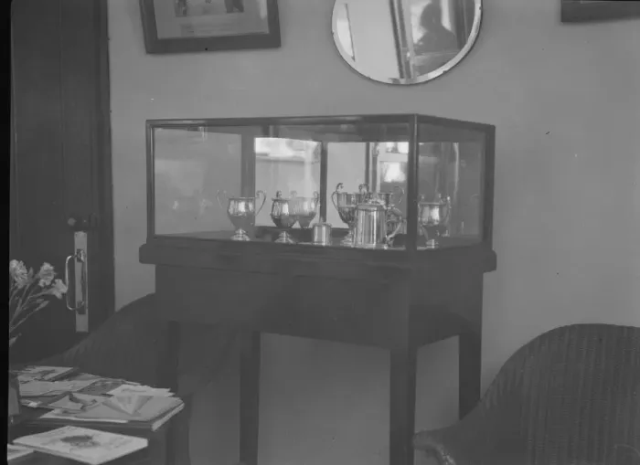 Framed Print : Cabinet containing motor racing trophies. Artist: Bill Brunell Framed Print : Cabinet containing motor racing trophies. Artist: Bill Brunell