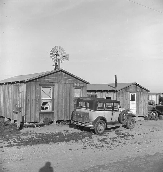 Cabins which rent for ten dollars a month, Greenfield, Salinas Valley, California, 1939. Creator: Dorothea Lange