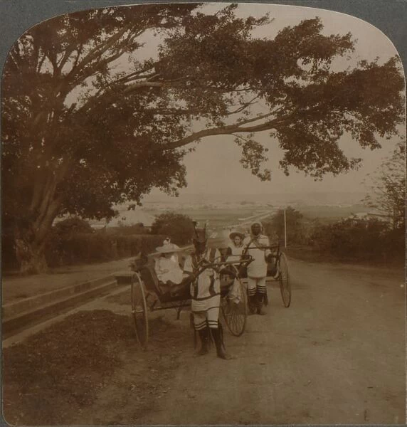 Cabs drawn by natives on a residence road, Durban, S. Africa, c1900