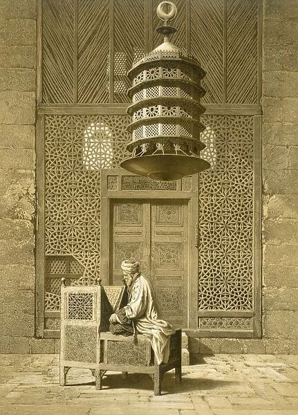 Cairo: Funerary or Sepuchral Mosque of Sultan Barquoq seated Imam reading the Koran