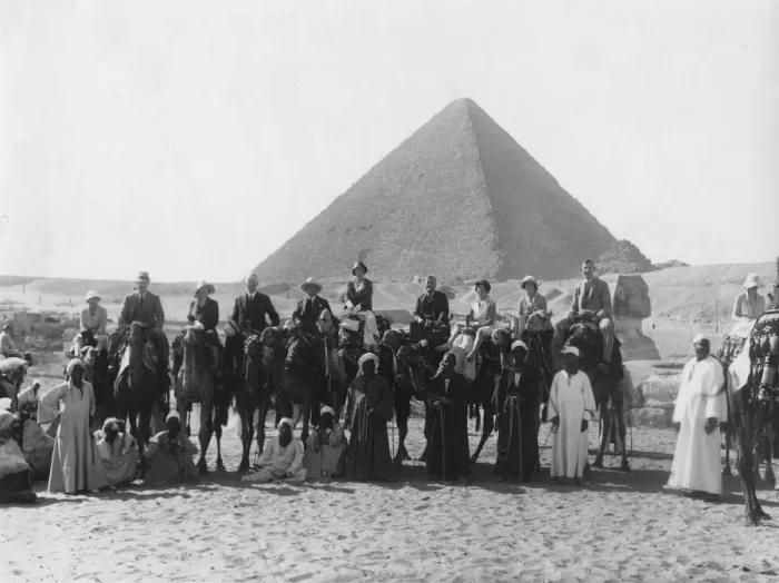 Framed Print : Camel tour in front of one of the Pyramids of Giza, Egypt, c1920s-c1930s(?) Framed Print : Camel tour in front of one of the Pyramids of Giza, Egypt, c1920s-c1930s(?)