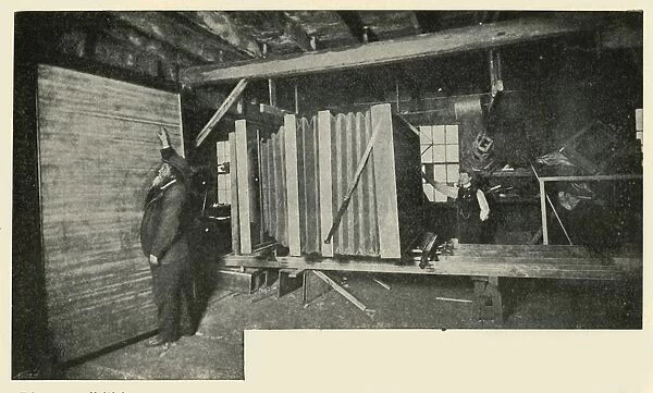 The Camera In The Workshop - Showing The Size Of The Plate Holder, 1901. Creator: Unknown