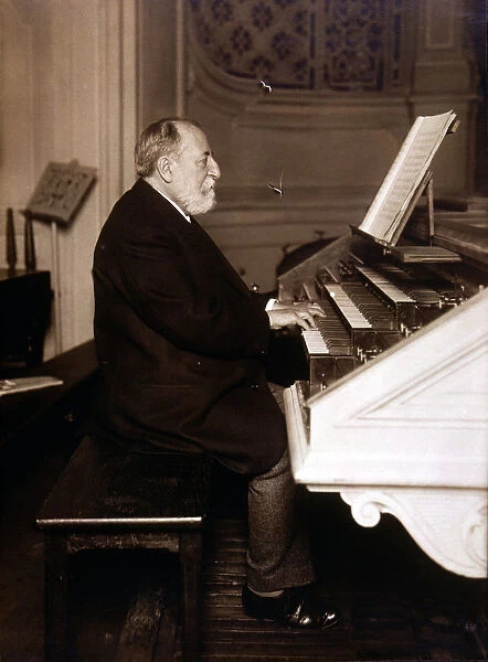 Camille Saint-Saens (1835 - 1921), French composer, photography playing the organ