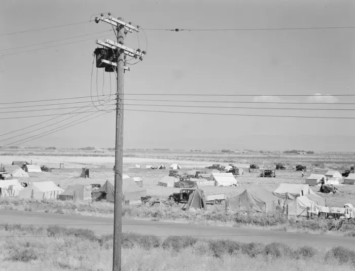 Framed Print : Camp of migrant potato pickers seen from potato shed... Tulelake, Siskiyou County, California, 1939 Creator: Dorothea Lange Framed Print : Camp of migrant potato pickers seen from potato shed... Tulelake, Siskiyou County, California, 1939 Creator: Dorothea Lange