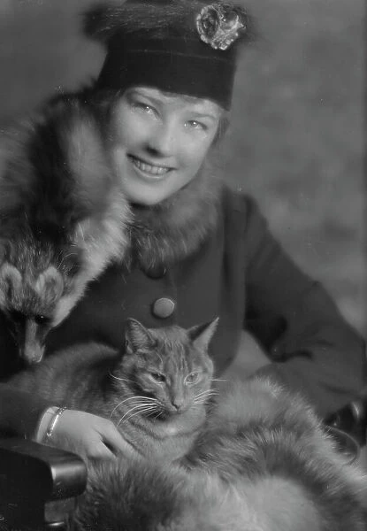 Campbell, Natalie, Miss, with Buzzer the cat, portrait photograph, 1914 Dec. 24. Creator: Arnold Genthe