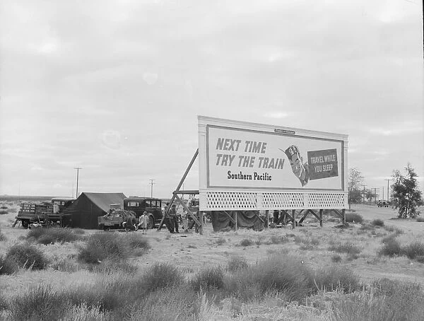 Camped in the rain behind billboard...on U.S. 99, near Famosa, Kern County, California, 1939. Creator: Dorothea Lange
