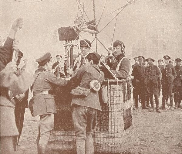 Canadian official cinematographer and assistant ready to ascend in a kite balloon, c1917 (1919)