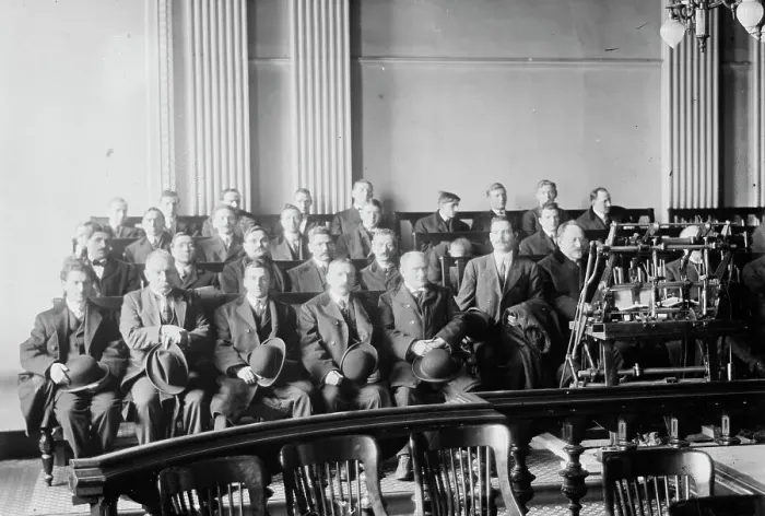 Framed Print : Candidates for naturalization seated in room, hats in laps, 1916. Creator: Bain News Service Framed Print : Candidates for naturalization seated in room, hats in laps, 1916. Creator: Bain News Service