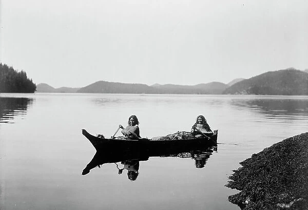 Canoeing on Clayquot Sound, c1910. Creator: Edward Sheriff Curtis