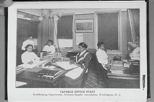 Capable office staff; Bookkeeping department; National Benefit Association, Washington, D.C. 1917. Creator: Unknown