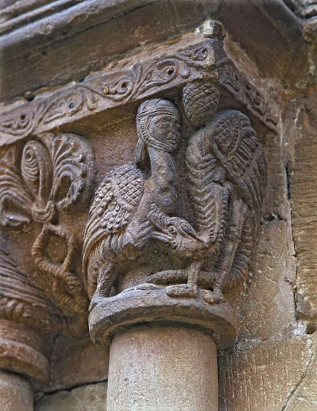 Capital with anthropomorphic decoration on the outside of one of the galleries of