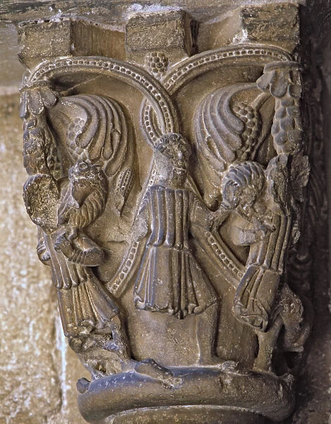 Capital decorated with the Good Shepherd with two figures on each side carrying a lamb