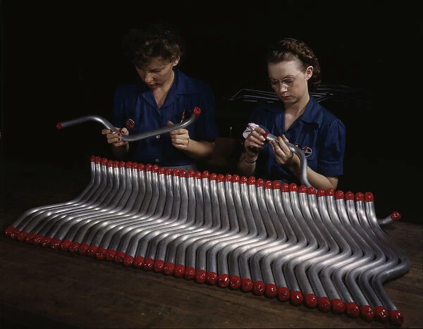 Capping and inspecting tubing: two women are shown... at Vultees Nashville division, Tennessee, 1943 Creator: Alfred T Palmer