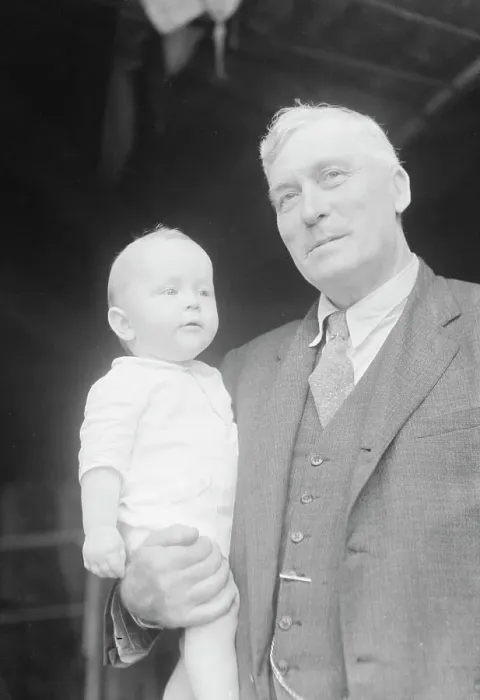 Framed Print : Captain Everett Edwards and baby, portrait photograph, 1933. Creator: Arnold Genthe Framed Print : Captain Everett Edwards and baby, portrait photograph, 1933. Creator: Arnold Genthe