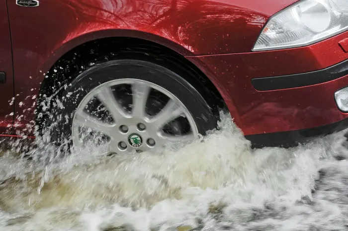 Framed Print : Car driving through flood Framed Print : Car driving through flood