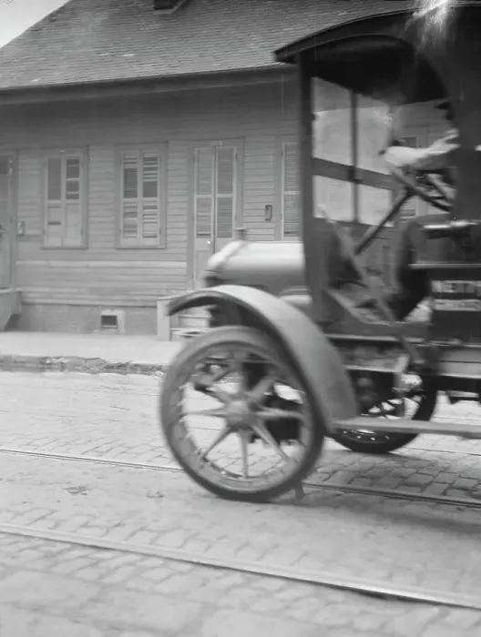 Framed Print : Car driving down a street, New Orleans or Charleston, South Carolina, between 1920 and 1926. Creator: Arnold Genthe Framed Print : Car driving down a street, New Orleans or Charleston, South Carolina, between 1920 and 1926. Creator: Arnold Genthe