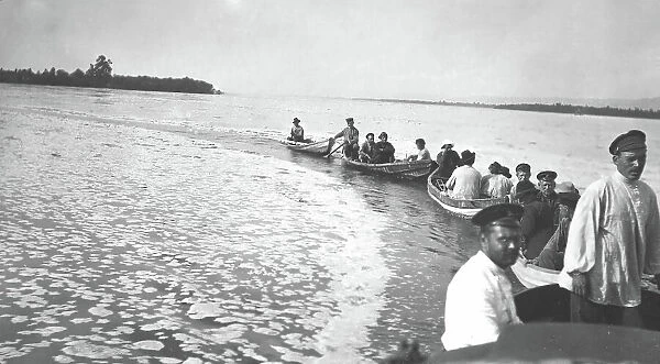 A caravan of boats from a survey party on the Zeya River during a flood, 1909. Creator: Vladimir Ivanovich Fedorov