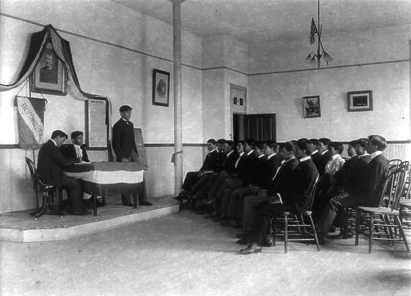 Carlisle Indian School, Carlisle, Pa. Classroom debate by debating society, 1901. Creator: Frances Benjamin Johnston