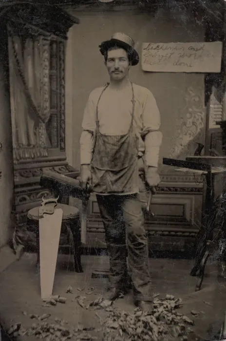 Framed Print : Carpenter or Cabinetmaker Standing Before a Sign Advertising His Trade, 1860s-80s Framed Print : Carpenter or Cabinetmaker Standing Before a Sign Advertising His Trade, 1860s-80s