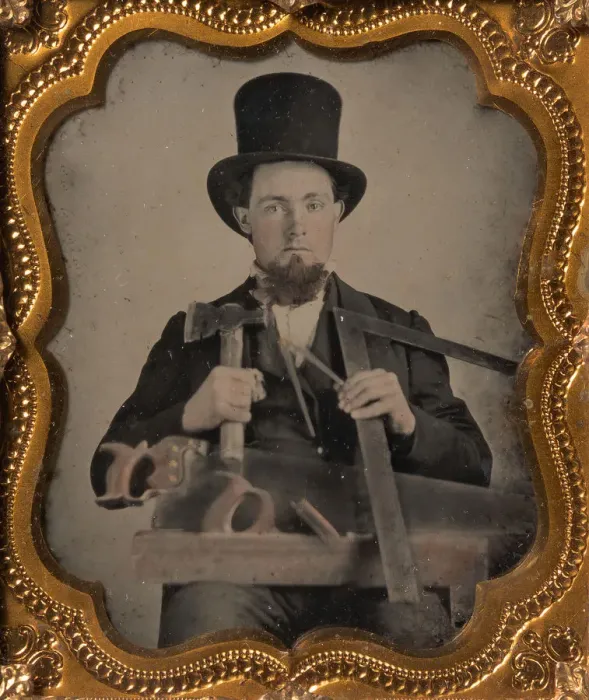 Framed Print : Carpenter in Top Hat with Hatchet, Compass, Square, and Hand Saw, 1850s-60s Framed Print : Carpenter in Top Hat with Hatchet, Compass, Square, and Hand Saw, 1850s-60s