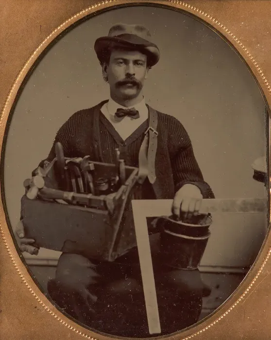 Framed Print : Carpenter Holding a Bag of Tools and a Square, 1880-90s. Creator: Unknown Framed Print : Carpenter Holding a Bag of Tools and a Square, 1880-90s. Creator: Unknown
