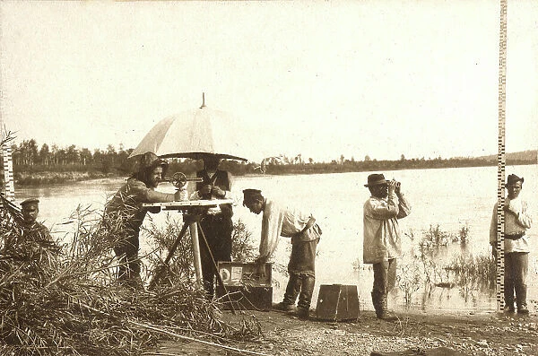 Carrying out a scale survey on the banks of the Zeya River, 1909. Creator: Vladimir Ivanovich Fedorov