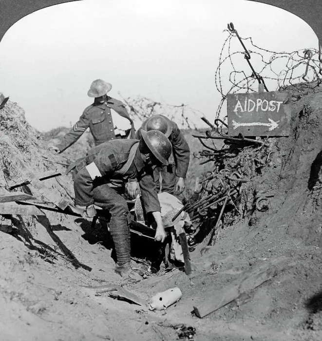 Framed Print : Carrying a wounded soldier to a first aid post, Passchendaele, Belgium, World War I, 1914-1918. Artist: Realistic Travels Publishers Framed Print : Carrying a wounded soldier to a first aid post, Passchendaele, Belgium, World War I, 1914-1918. Artist: Realistic Travels Publishers