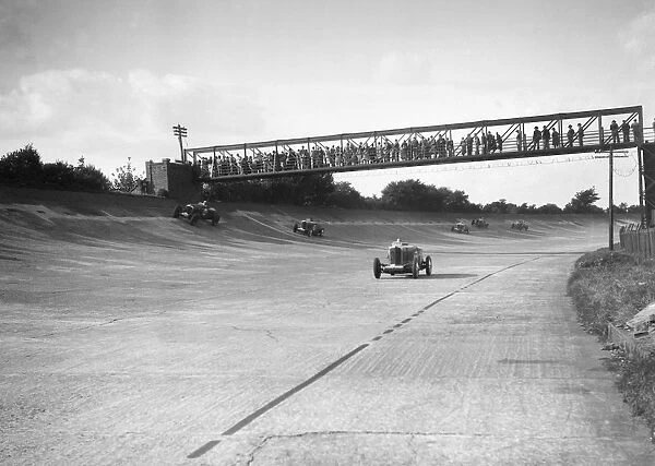 Cars racing on Byfleet Banking during the BRDC 500 Mile Race, Brooklands, 3 October 1931