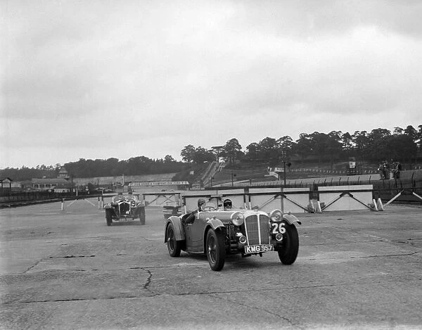 Cars racing through the chicane, JCC Members Day, Brooklands, 8 July 1939. Artist: Bill Brunell