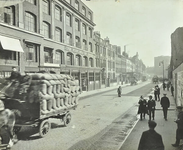 Cart laden with sacks, Mansell Street, Stepney, London, 1914