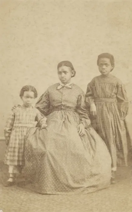 Framed Print : Carte-de-visite of a young woman and two children, 1864 - 1866 Framed Print : Carte-de-visite of a young woman and two children, 1864 - 1866