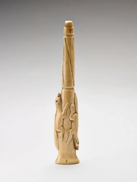 Framed Print : Carved harpoon foreshaft with two running foxes carved in relief, 1880-1920. Creator: Unknown Framed Print : Carved harpoon foreshaft with two running foxes carved in relief, 1880-1920. Creator: Unknown