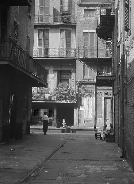 Cathedral Alley, New Orleans, between 1920 and 1926. Creator: Arnold Genthe