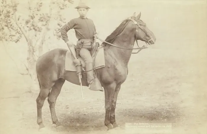 Framed Print : The Cavalier The young soldier and his horse on duty [a]t camp Cheyenne []  / , 1890. Creator: John C. H. Grabill