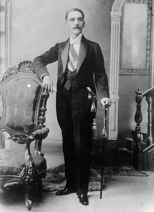 Framed Print : C.E. Restrepo posing next to chair, with cane, 1910. Creator: Bain News Service Framed Print : C.E. Restrepo posing next to chair, with cane, 1910. Creator: Bain News Service