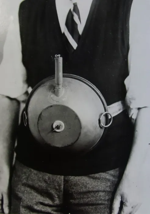 Framed Print : Cecil Vandepeer Clarke wearing an early version of the limpet mine on a keeper plate, c1939. Creator: British Government Framed Print : Cecil Vandepeer Clarke wearing an early version of the limpet mine on a keeper plate, c1939. Creator: British Government