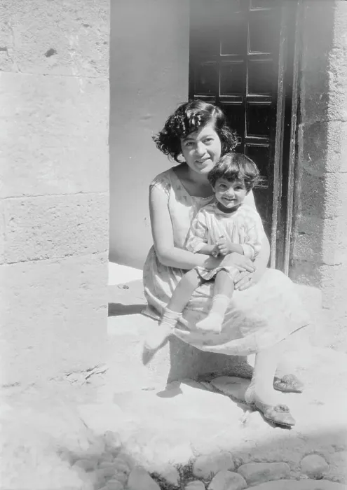Framed Print : Cenerini, Mrs. and child, seated on a doorstep, 1929 Creator: Arnold Genthe Framed Print : Cenerini, Mrs. and child, seated on a doorstep, 1929 Creator: Arnold Genthe