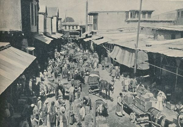 Chaffering Oriental Crowds That Throng The Street Markets, c1935. Artist: Charles H Gabriel