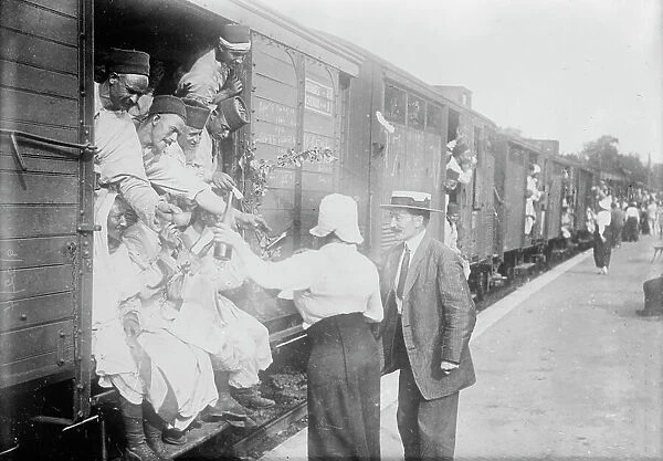 At Champigny, giving wine to Algerian troops, between c1914 and c1915. Creator: Bain News Service