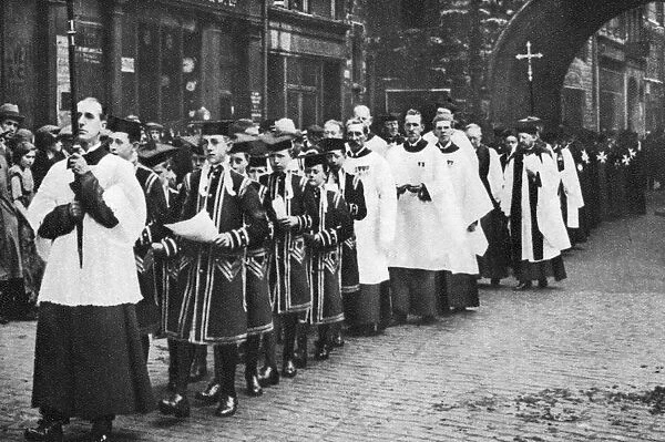 Chapel Royal choirboys in procession, Clerkenwell, London, 1926-1927