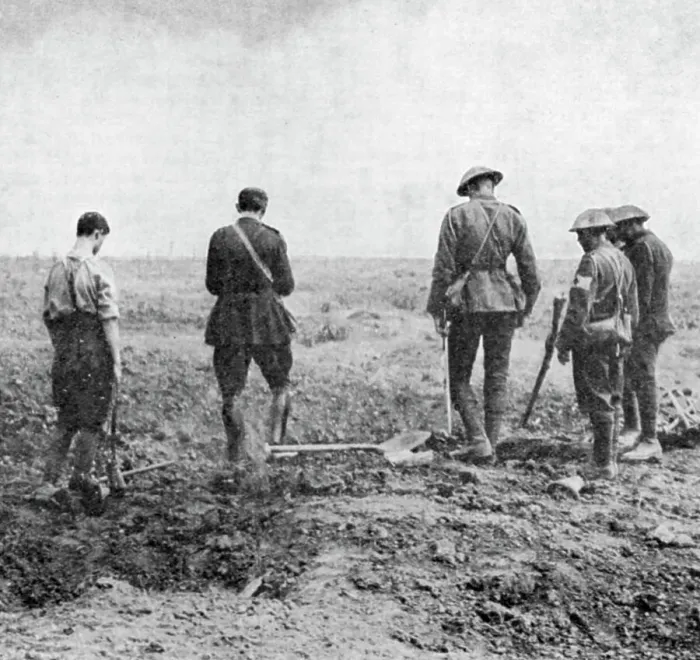 Framed Print : Chaplain conducting burial service in the field while burial party pay their respects, c1916 Framed Print : Chaplain conducting burial service in the field while burial party pay their respects, c1916
