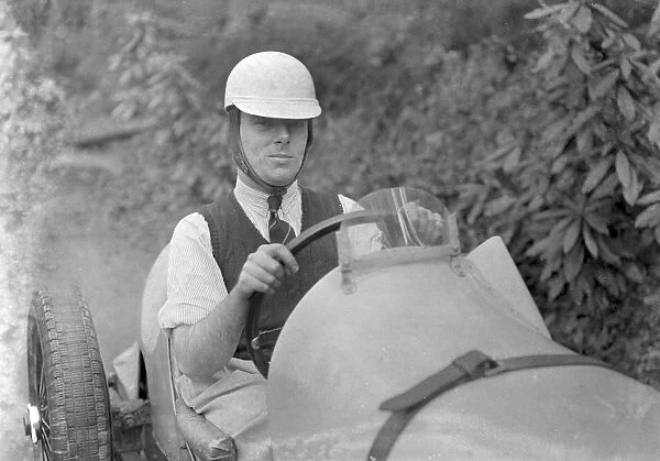 Charles Mortimer behind the wheel of an offset-bodied single-seater MG KN Special