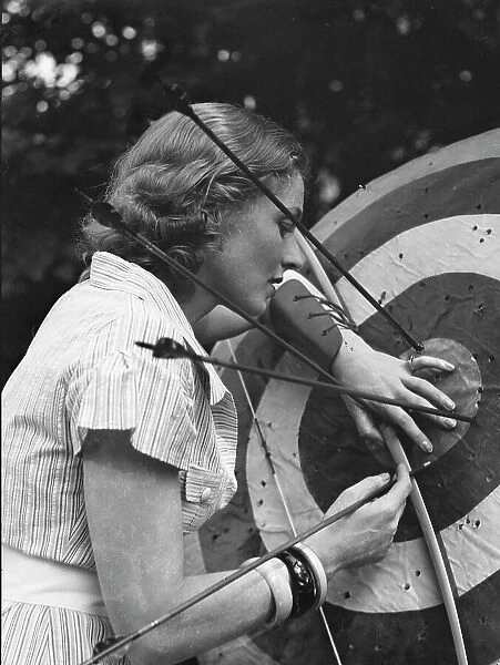 Chase, Diana, Miss, doing archery, 1933 June 22. Creator: Arnold Genthe