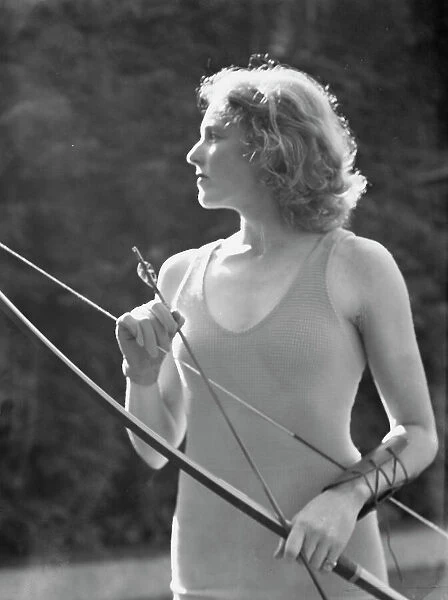 Chase, Diana, Miss, doing archery, 1933 June 22. Creator: Arnold Genthe
